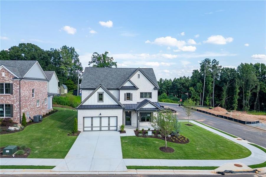 Front exterior of a new home in , Buford, GA, highlighting curb appeal (Image 29).