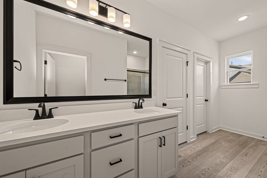 Furnished interior view inside a new home in Aldeana, Bonney (Image 18).