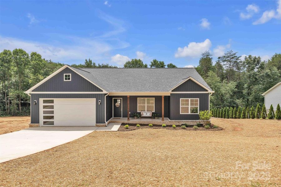 Front exterior of a new home in , Taylorsville, NC, highlighting curb appeal (Image 26).