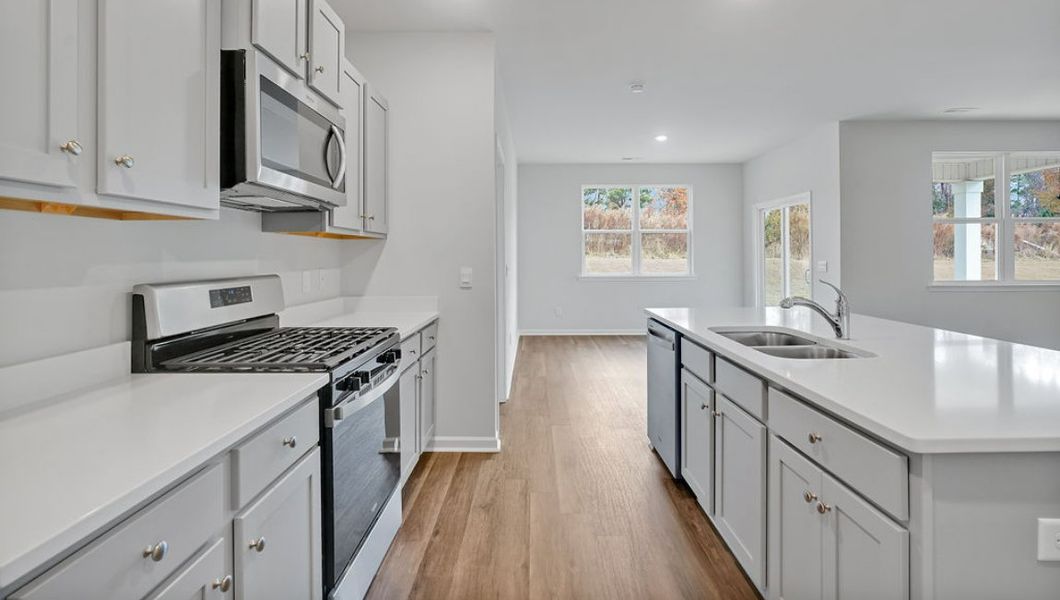 Representative furnished interior of a home built from the ARIA by D.R. Horton in Bella Point, Bolivia (Image 7).