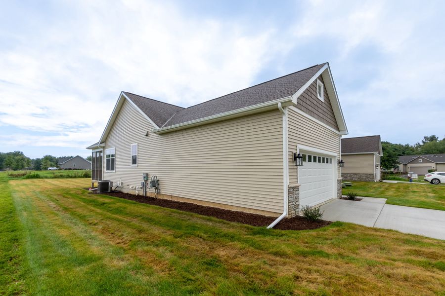 Representative exterior details of a home built from the The Esher Paired Ranch Condominium by Norfolk Homes in Mystic Ridge, Whitmore Lake (Image 3).