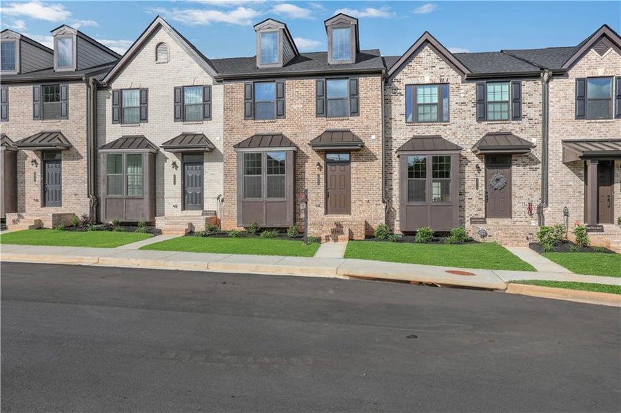 Front exterior of a new home in , Lawrenceville, GA, highlighting curb appeal (Image 2). Front exterior of a new home in , Lawrenceville, GA, highlighting curb appeal (Image 2).