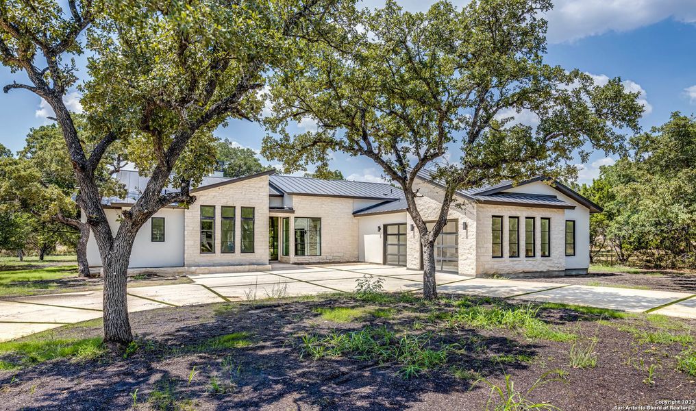 Front exterior of a new home in , San Antonio, TX, highlighting curb appeal (Image 22). Front exterior of a new home in , San Antonio, TX, highlighting curb appeal (Image 22).