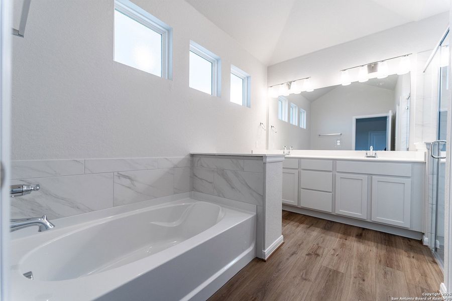 Furnished interior view inside a new home in The Woodlands at Medina Hills, Mico (Image 9).