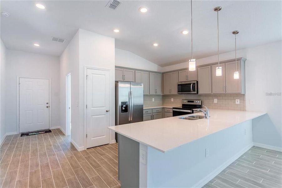 Furnished interior view inside a new home in , Port Charlotte (Image 14). Furnished interior view inside a new home in , Port Charlotte (Image 14).