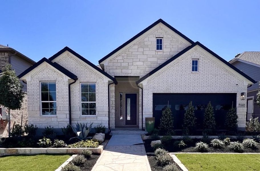 Representative exterior photo of a completed home built from the Barron by Chesmar Homes in The Grove at Blackhawk, Pflugerville, TX (Image 13). Representative exterior photo of a completed home built from the Barron by Chesmar Homes in The Grove at Blackhawk, Pflugerville, TX (Image 13).