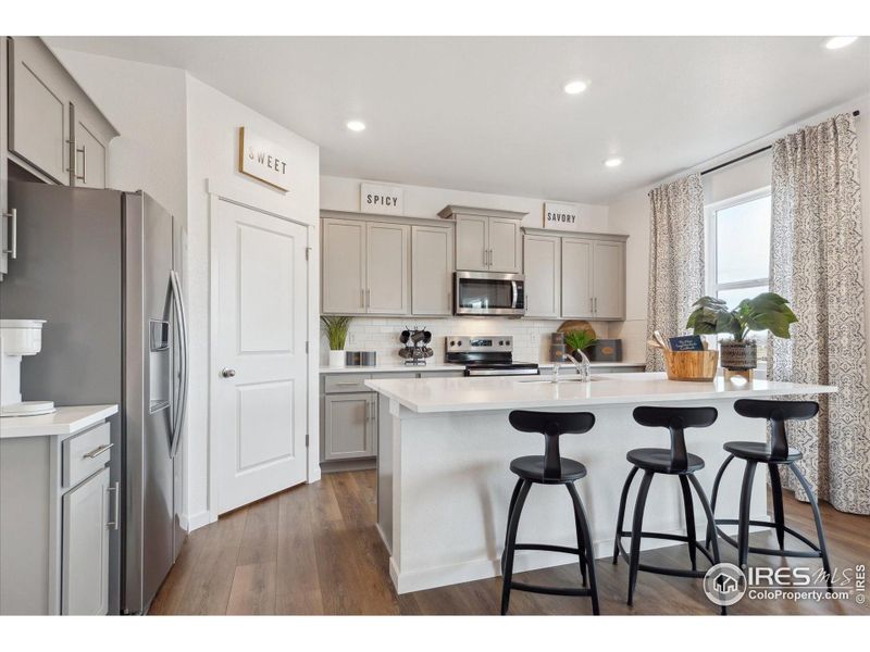 Furnished interior view inside a new home in Vista Meadows, Fort Lupton (Image 8).