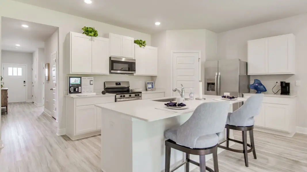 Furnished interior view inside a new home in Ashton Park Phase III, Freeport (Image 3).