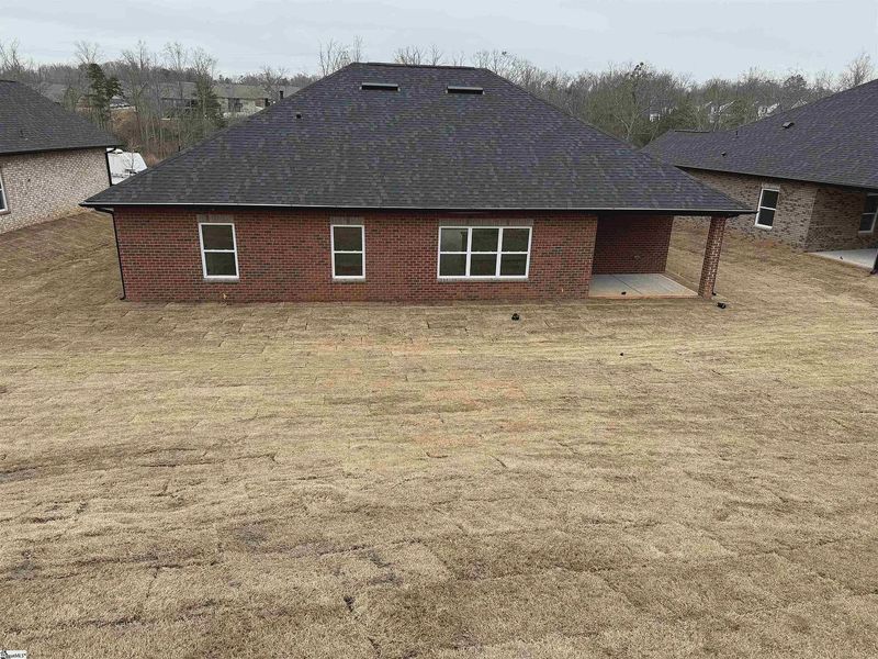 Exterior details and patio area of a home in Hidden Lake Estates, Greenville (Image 12).