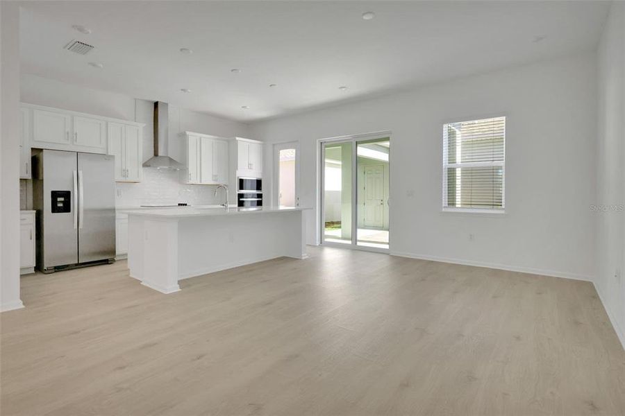 Spacious, unfurnished interior of a new home in Serenade at Ovation, Winter Garden (Image 23).