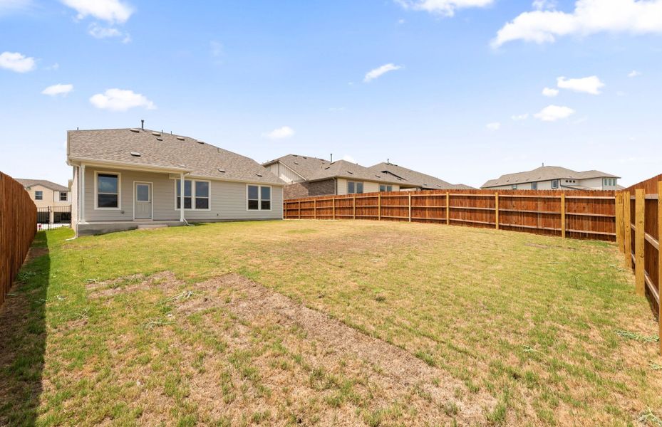 Exterior details and patio area of a home in Saddleback at Santa Rita Ranch, Liberty Hill (Image 3).