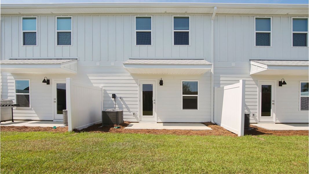Representative exterior details of a home built from the Palm Interior by D.R. Horton in Caballeros Estates Townhomes at Hombre, Panama City Beach (Image 4). Representative exterior details of a home built from the Palm Interior by D.R. Horton in Caballeros Estates Townhomes at Hombre, Panama City Beach (Image 4).