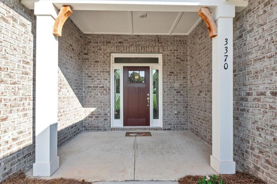 Exterior details and patio area of a home in Tuscany Hills, Douglasville (Image 24).