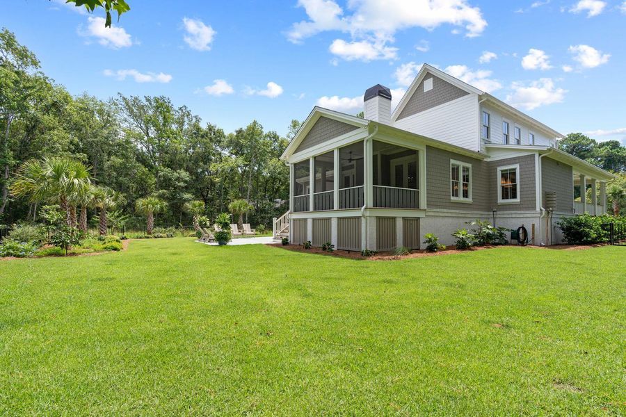 Front exterior of a new home in , Johns Island, SC, highlighting curb appeal (Image 19). Front exterior of a new home in , Johns Island, SC, highlighting curb appeal (Image 19).