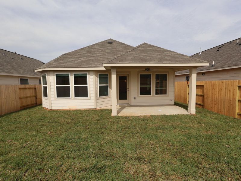 Exterior details and patio area of a home in Lone Star Landing, Montgomery (Image 4).