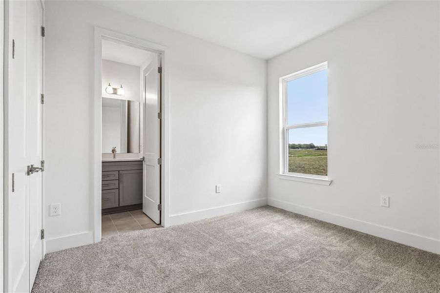Spacious, unfurnished interior of a new home in Lakeside at Satilla, St. Cloud (Image 20).
