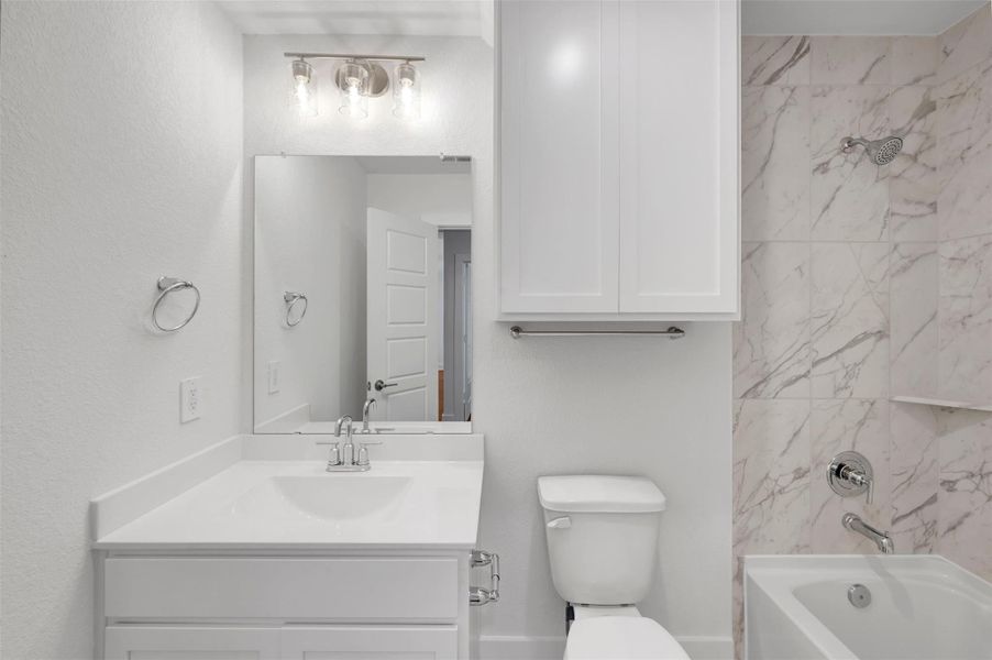 Furnished interior view inside a new home in Sorella, Tomball (Image 13).