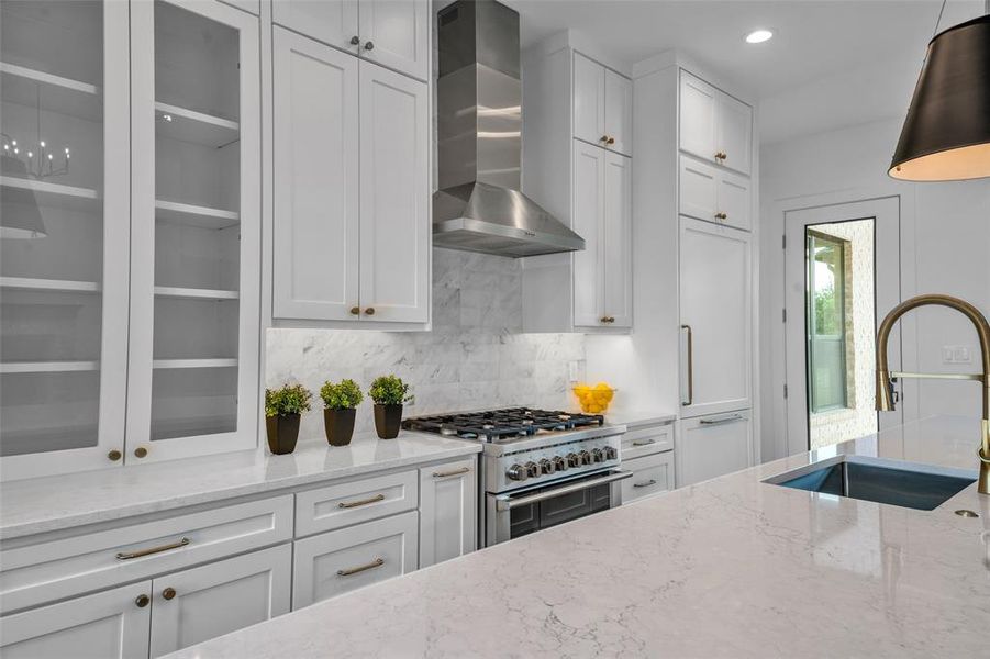 Gas range with built-in refrigerator.