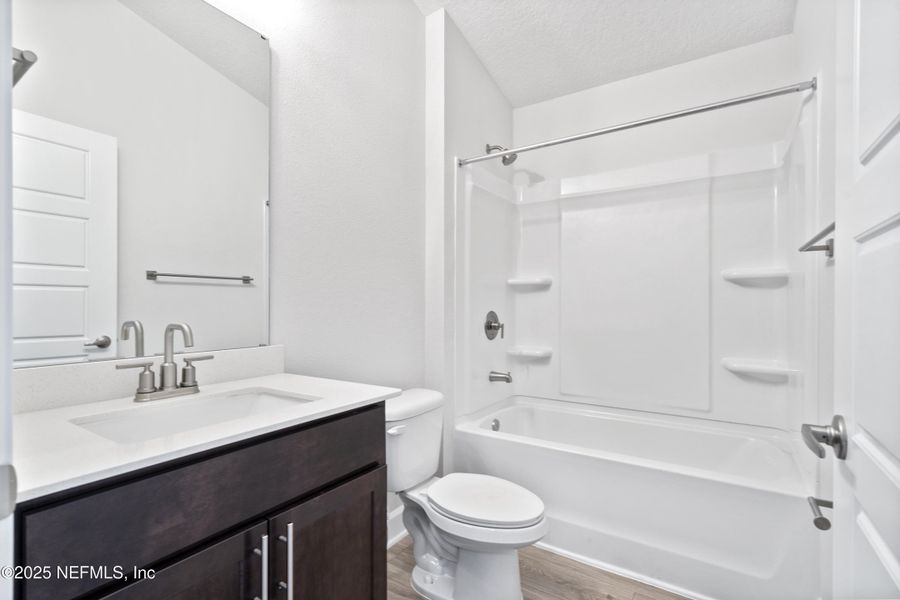 Furnished interior view inside a new home in Shadow Crest at Rolling Hills, Green Cove Springs (Image 7).