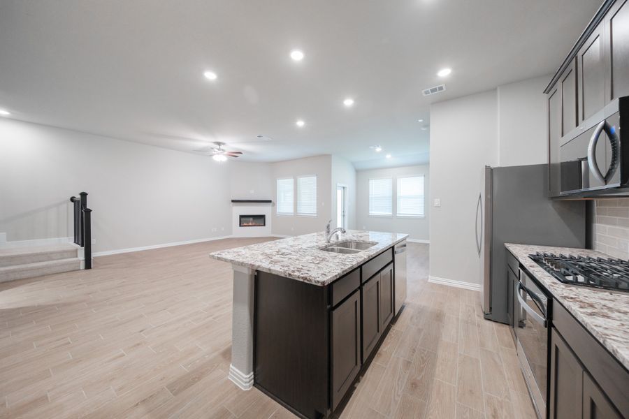 Furnished interior view inside a new home in The Villages of Hurricane Creek, Anna (Image 7).