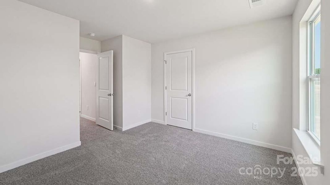 Spacious, unfurnished interior of a new home in Cardinal Creek, Charlotte (Image 15).