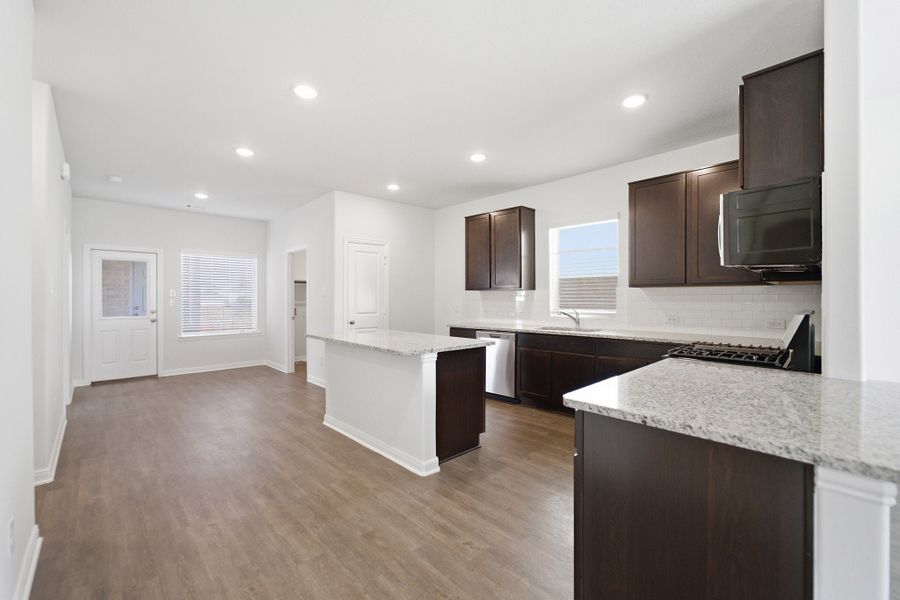 Furnished interior view inside a new home in La Terra, Celina (Image 27).
