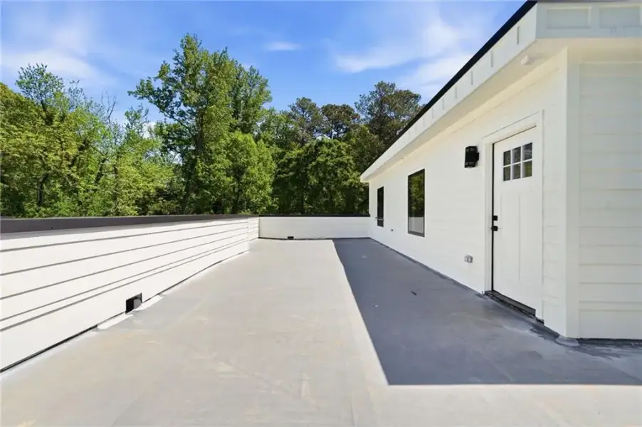 Exterior details and patio area of a home in , Roswell (Image 37).