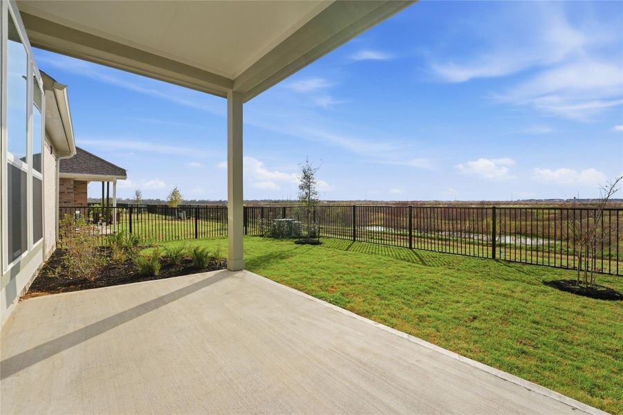 Exterior details and patio area of a home in Bridgeland, Cypress (Image 2).
