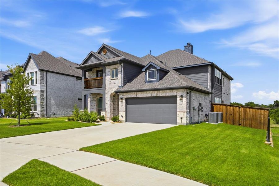 Front exterior of a new home in , Providence Village, TX, highlighting curb appeal (Image 27). Front exterior of a new home in , Providence Village, TX, highlighting curb appeal (Image 27).