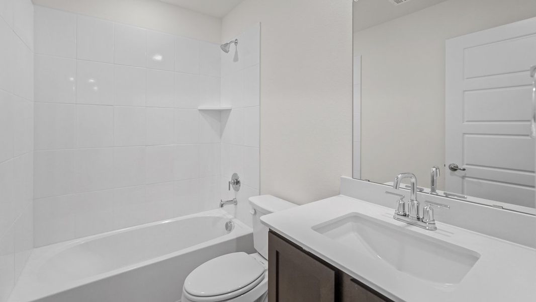 Representative furnished interior of a home built from the Violet by D.R. Horton in Windchime, Celina (Image 7).