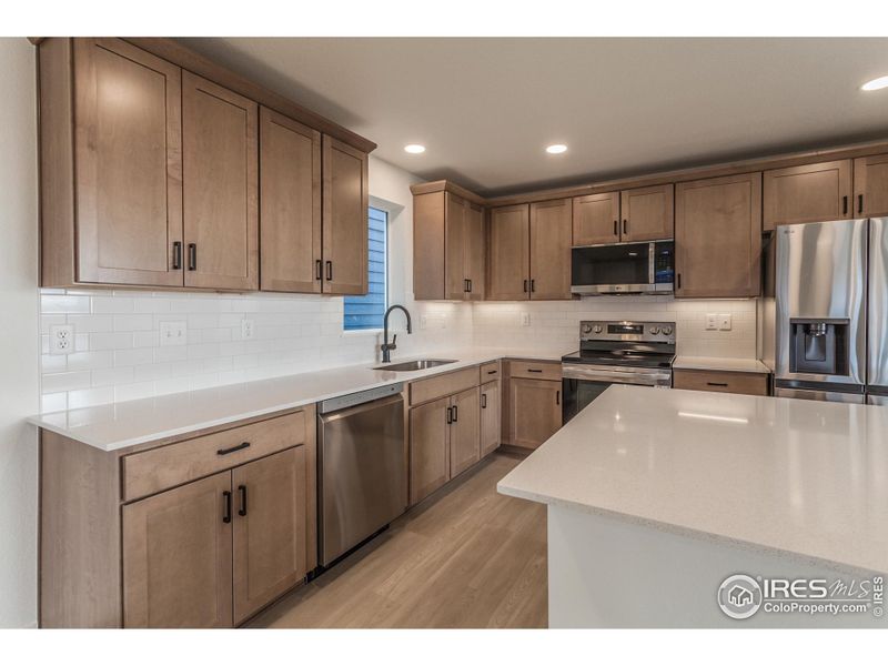 EXAMPLE PHOTO: KITCHEN W/ S.S. APPLIANCES EXAMPLE PHOTO: KITCHEN W/ S.S. APPLIANCES