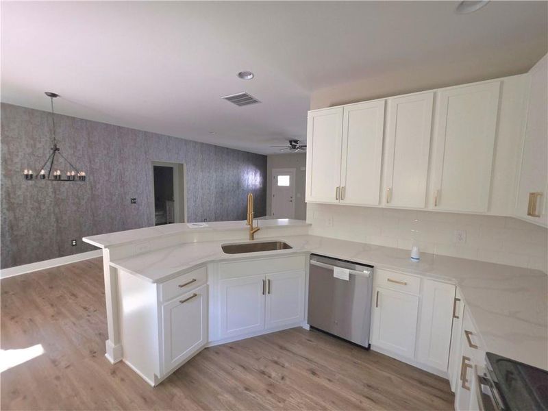 Furnished interior view inside a new home in , Statham (Image 3).