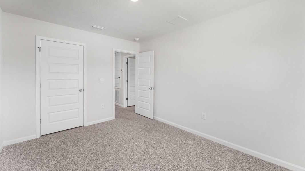 Representative unfurnished interior of a home built from the The Aisle by D.R. Horton in Chateau Nemours, Port Saint Joe (Image 36).