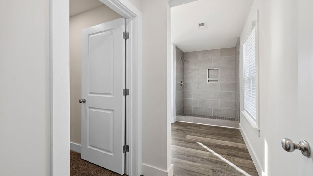 Representative unfurnished interior of a home built from the Phoenix by D.R. Horton in Edgewood Estates, Greenville (Image 26).
