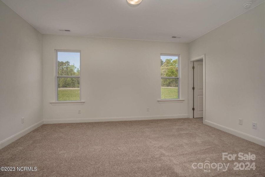 Concept Photo of Spacious Primary Bedroom with walk in closet & private bath!