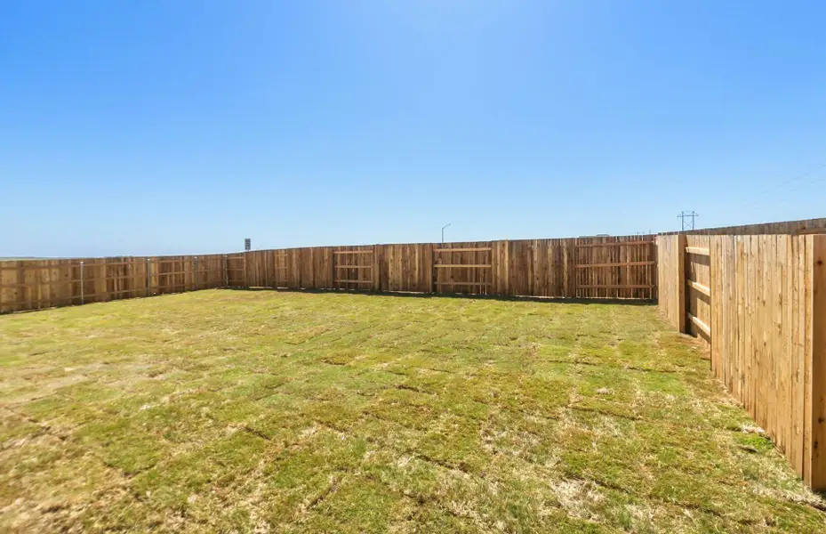 Exterior details and patio area of a home in Sunfield, Buda (Image 3).