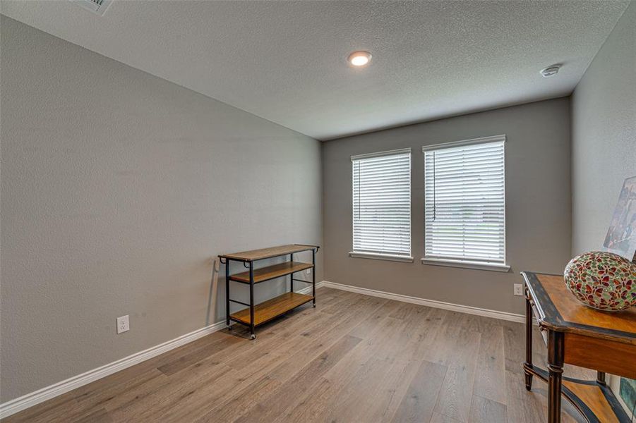 Furnished interior view inside a new home in Fireside by the Lake, Garland (Image 11).