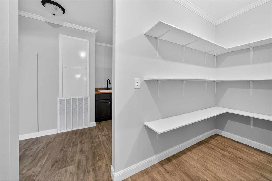 Storage area featuring a sink Storage area featuring a sink