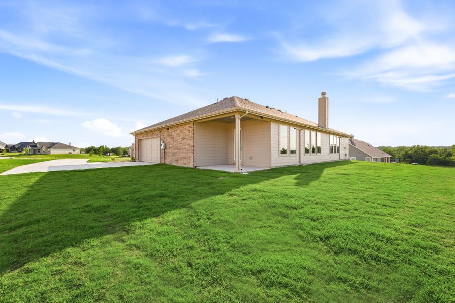 Exterior details and patio area of a home in Saddleback Estates, Boyd (Image 27).