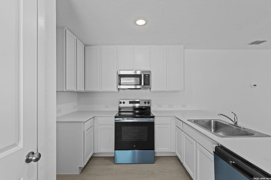 Furnished interior view inside a new home in Higdon Crossing, San Antonio (Image 6).