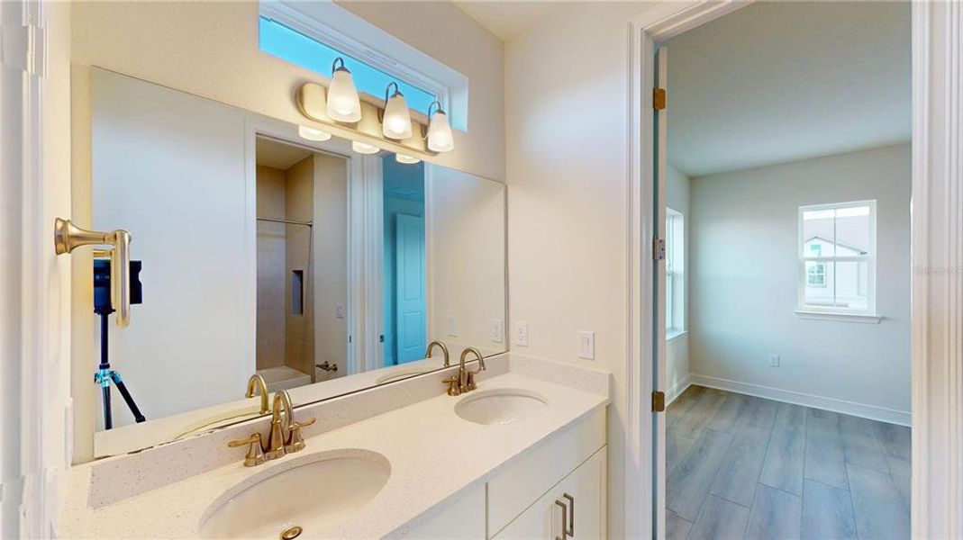 Furnished interior view inside a new home in Laureate Park, Orlando (Image 8).