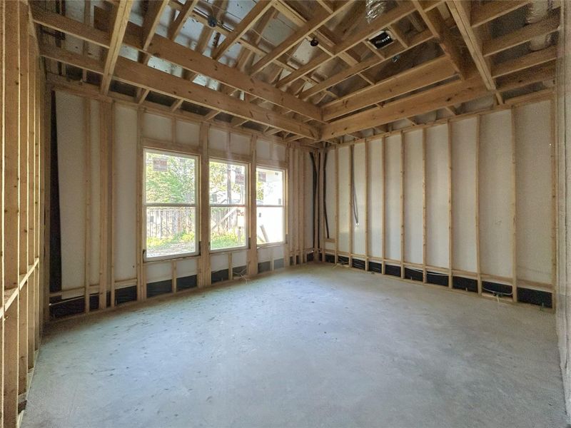 Primary Bedroom With Large Windows. Construction Photo as of 7/20/2026