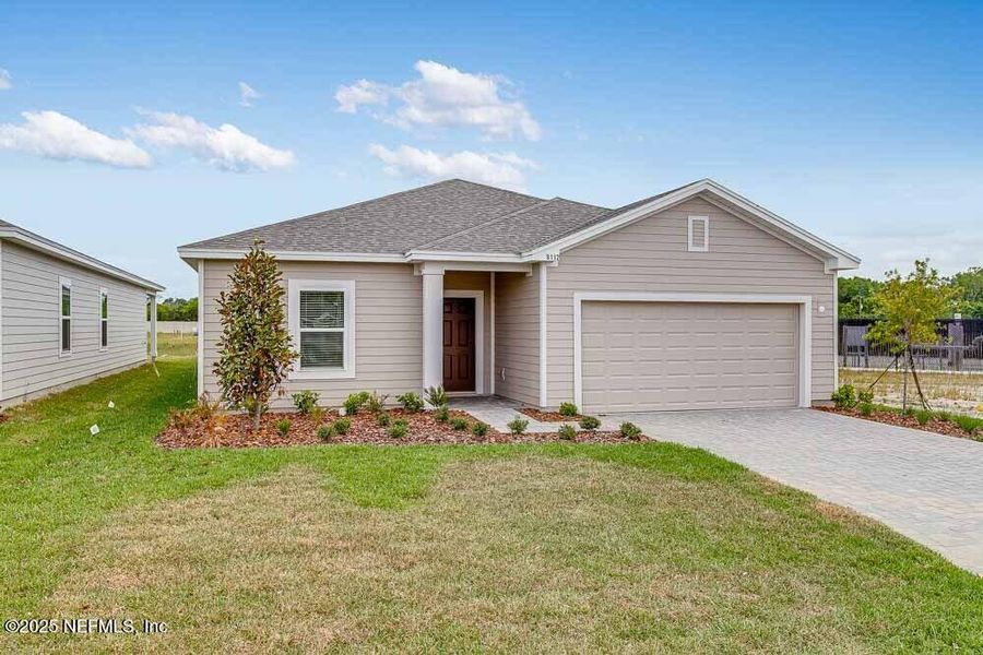Front exterior of a new home in Coopers Meadow, Jacksonville, FL, highlighting curb appeal (Image 22).