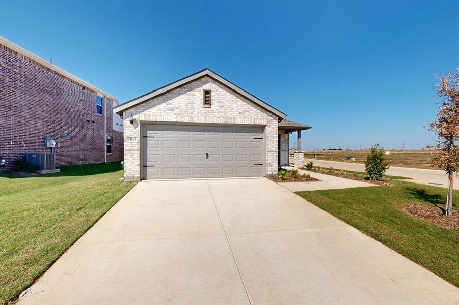 Front exterior of a new home in Mobberly Farms, Pilot Point, TX, highlighting curb appeal (Image 19).