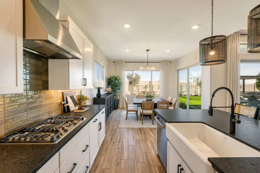 Representative furnished interior of a home built from the Mojave Plan 60-3 by Tri Pointe Homes in Abel Ranch, Goodyear (Image 7).