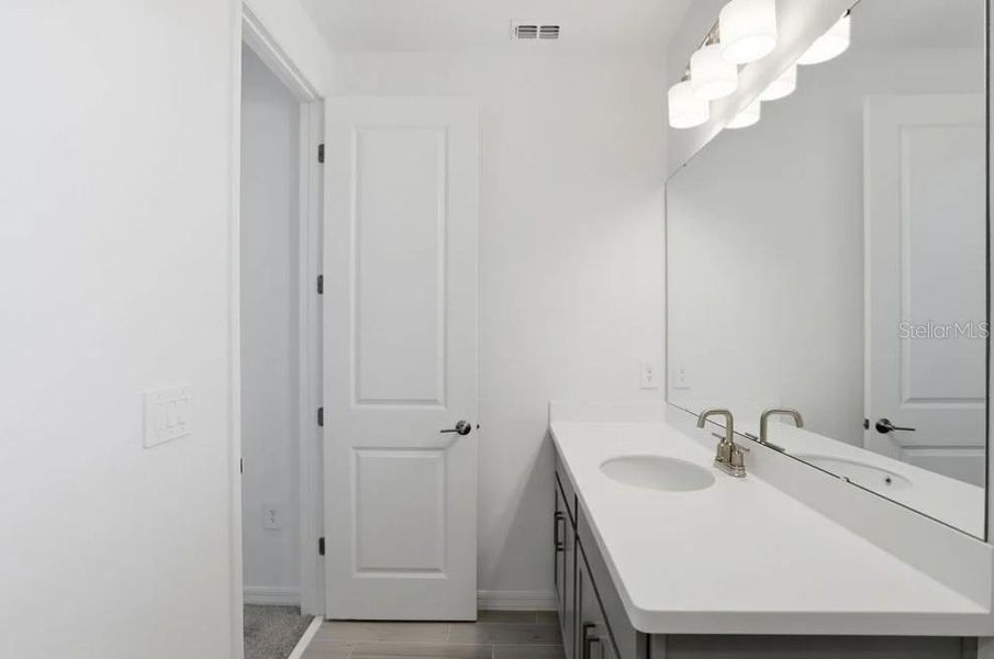 Furnished interior view inside a new home in Harvest at Ovation, Winter Garden (Image 9). Furnished interior view inside a new home in Harvest at Ovation, Winter Garden (Image 9).