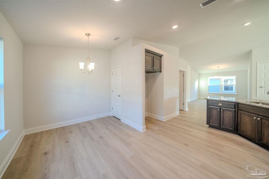 Spacious, unfurnished interior of a new home in Pine Top, Cantonment (Image 6).