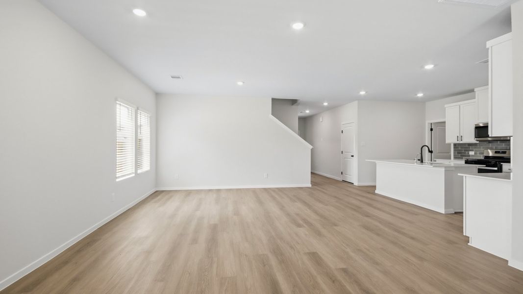 Representative unfurnished interior of a home built from the Perry by D.R. Horton in New Waverly Station, New Waverly (Image 12).