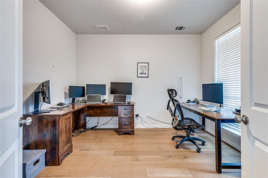 Office featuring light hardwood / wood-style flooring