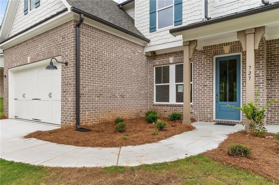 Exterior details and patio area of a home in Ashbury Commons, Powder Springs (Image 2).